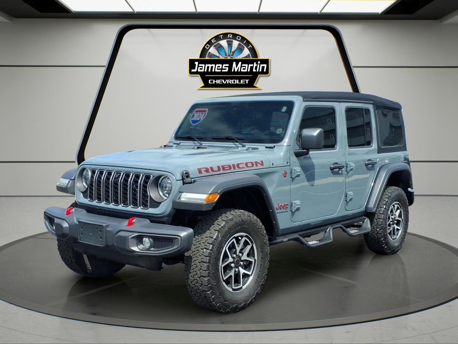 2024 Jeep Wrangler Rubicon in Anvil — front three-quarter view
