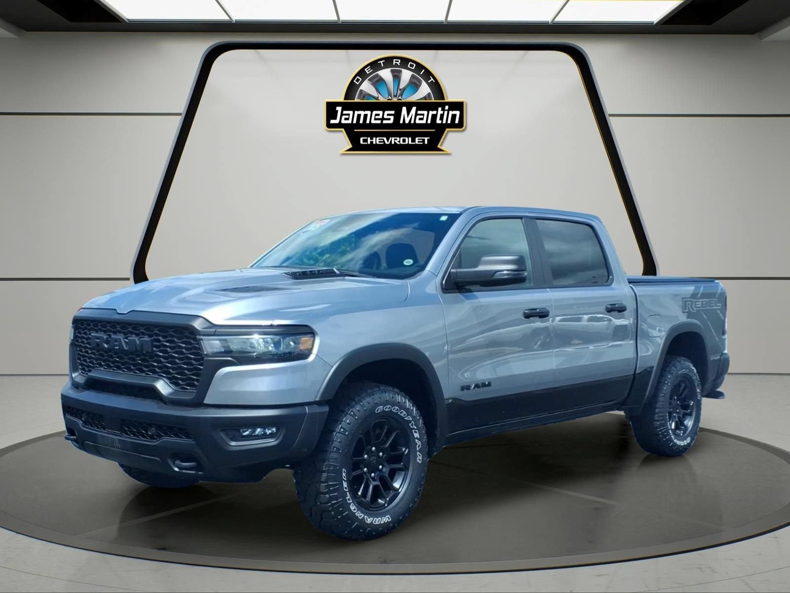 2025 RAM 1500 Rebel in Billet Silver Met — front three-quarter view