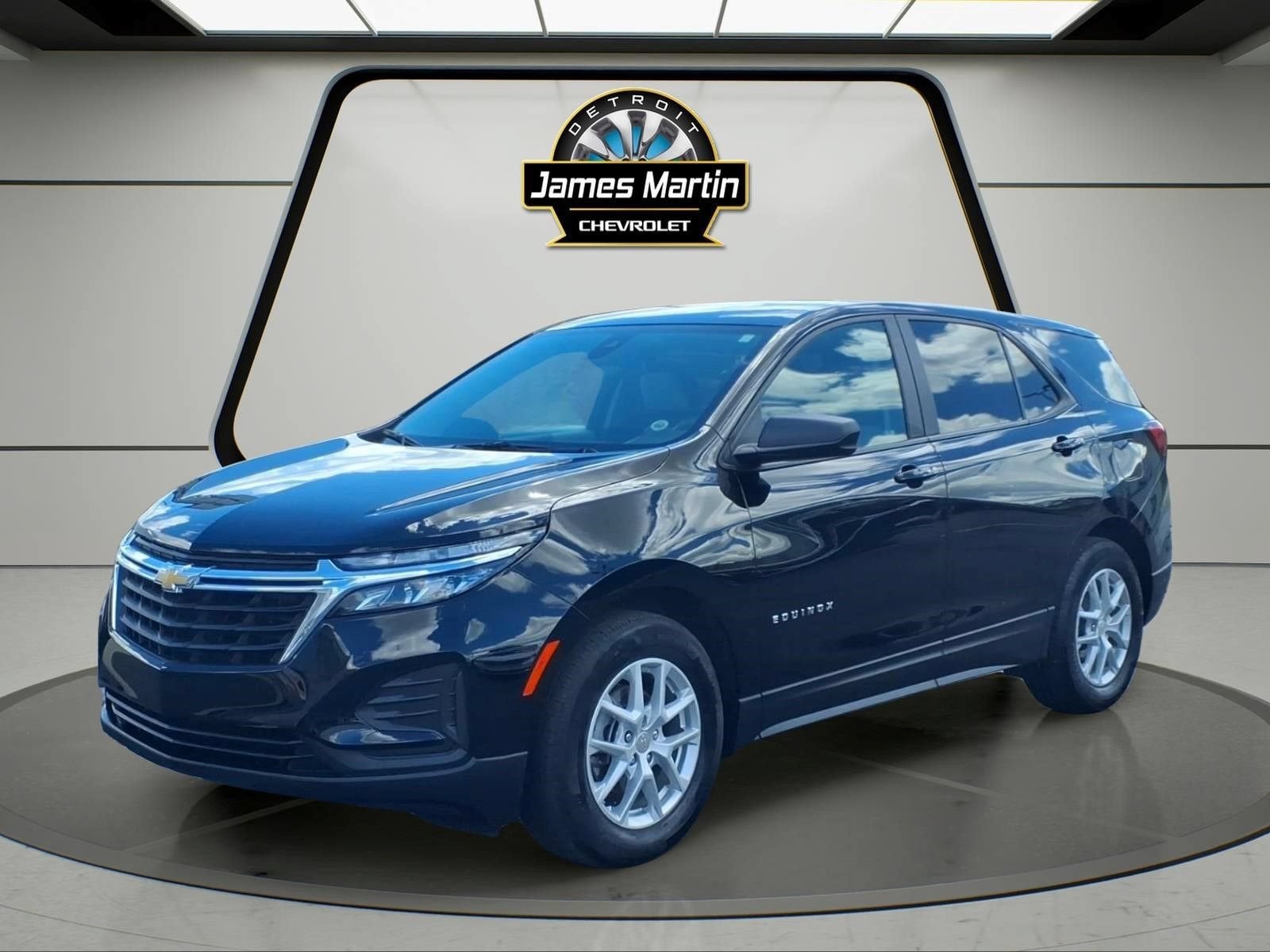 2024 Chevrolet Equinox LS in Mosaic Black Metallic — front three-quarter view